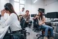 Inside of call center. Young business people working together in the modern office Royalty Free Stock Photo