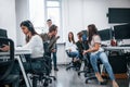 Inside of call center. Young business people working together in the modern office Royalty Free Stock Photo