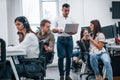 Inside of call center. Young business people working together in the modern office Royalty Free Stock Photo