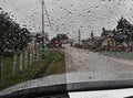 Inside car view blurred traffic in rainy day Royalty Free Stock Photo