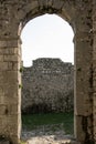 Inside the castle - view of the ancient castle`s door with arch, Shkoder, Albania Royalty Free Stock Photo