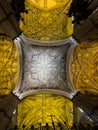 Inside the Cathedral of Seville columns with incredible Details of stucco decoration wide angle shot in Seville, Andalusia, Spain