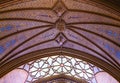 Inside the Catholic church is an altar with icons and lamps. organ, ancient decoration, Gothic, stained glass windows, columns. Royalty Free Stock Photo