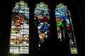 Inside the Catholic church window with icons and lamps. ancient decoration, Gothic, stained glass windows, columns. Royalty Free Stock Photo