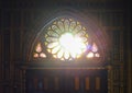 Inside the Catholic church window with icons and lamps. ancient decoration, Gothic, stained glass windows, columns.