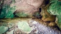 Inside of a cave in the mountain.