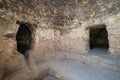 Inside the caves of Takht-e Rostam ancient buddhist stupa-monastery in Samangan, Afghanistan in August 2019