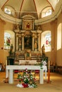 Inside of a church with altar and flower Royalty Free Stock Photo