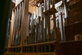 Inside a church organ, register with different pipes from metal, musical instrument Royalty Free Stock Photo