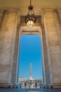 Inside the colossal Doric colonnades that delimit St. Peter`s Square in the Vatican