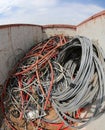 Inside a container full of pile of elettrical cables