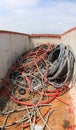 Inside a container full of pile of obsolete cables