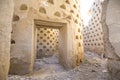 Inside crumbling walls of dovecote mud building in Ampudia