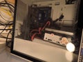 Inside a Desktop Computer Case with Cables and Components Royalty Free Stock Photo