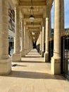 Colonnade separates colonnes de Buren from the garden of the Palais Royal