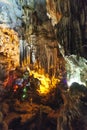 Inside Thien Cung Cave that decorated with artificial colourful lights at Ha Long Bay. Quang Ninh, Vietnam