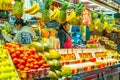 Inside Farmers Market with fresh fruits and fruit juice for sale Royalty Free Stock Photo