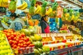 Inside Farmers Market with fresh fruits and fruit juice for sale