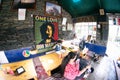 Inside fisheye shot with gopro of a colorful hillside cafe showing people relaxing eating drinking on the way to a