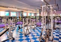 Inside of a gym with old rusty equipment