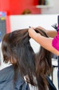 Inside a hairdressing, woman enjoy cutting their hair and dyeing it