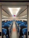 Inside the hushed confines of an empty passenger train