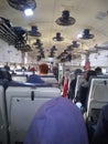 Inside indian train. See people site down .