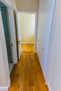 Inside interior of empty hallway with wooden floors in up-market house in the suburbs