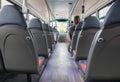 Inside interior of modern bus double decker bus showing seating and isle