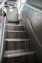 Inside interior of modern bus double decker bus showing stairs in stairway leading between decks