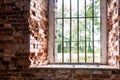 Inside interior of an old abandoned church in Latvia, Galgauska, window arches and a old brick wall Royalty Free Stock Photo