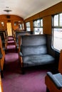 Inside interior of an old steam Train with no passengers Royalty Free Stock Photo