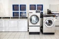 Inside Interior of washing machines in self service laundromat Royalty Free Stock Photo