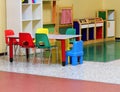 inside the kindergarten with small table and little chairs