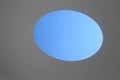 Inside the light installation `Sky-Space`. Optical illusion of a blue egg.