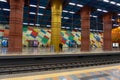 Inside the metro station in Lisbon Olaias with many tiles of different colors.