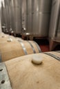 Inside of a modern winery having wine in oak barrels and aluminium tanks Royalty Free Stock Photo