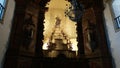 Inside Nossa Senhora do Rosario Church. Golden and wooden detais. Royalty Free Stock Photo