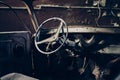 Inside of an old abandoned manual gearbox car with protruding wires Royalty Free Stock Photo