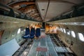 Inside of old abandoned passenger airplane. Plane wreck