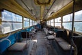 Inside old abandoned rusty wrecked bus or trolleybus