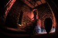 Inside of old creepy abandoned mansion. Staircase and colonnade. Silhouette of horror ghost standing on castle stairs to the Royalty Free Stock Photo