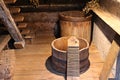 Inside an old ethnographic bathhouse with a large wooden bathing tub Royalty Free Stock Photo