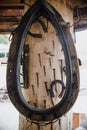 Inside an old vintage blacksmith and workshop, close up on horse