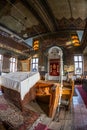 Inside of one small Orthodox Synagogue with lots of books in the