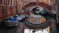 reflection of the bridge in the canal, Venice, Italy Royalty Free Stock Photo