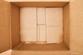 Inside open empty corrugated brown cardboard box. Top down shot Royalty Free Stock Photo