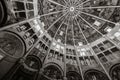 Inside Parma baptistery church in black and white