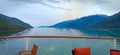 Inside passage in Alaska for ship. view of mountain and ocean from a cruise ships open bar Royalty Free Stock Photo