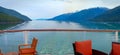 Inside passage in Alaska for ship. view of mountain and ocean from a cruise ships open bar Royalty Free Stock Photo